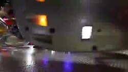 Colorful spinning wheel in amusement park at night Stock Footage