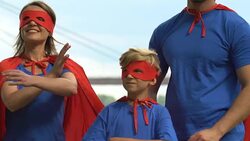 Super family crossing hands on chest in superhero pose, parents and kid together Stock Footage