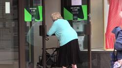 Mayor of Bristol hands out face masks to shoppers as they become mandatory in England News Clip