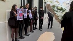 CLEAN : Apple Daily: Protesters lay coffin outside Chinese embassy in Paris News Clip
