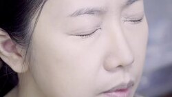 Professional make-up artist making up her model face Stock Footage