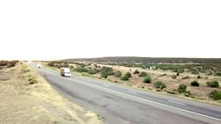 Aerial Drone Footage of Semi-Trucks Rolling Down the Highway Stock Footage