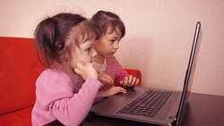 Children playing on laptop. Stock Footage
