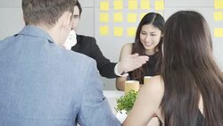 Brainstorming session  Team Business People designers and working on creative in the office Stock Footage