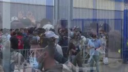 CLEAN : Migrants queue at the border in Ceuta to return to Morocco News Clip