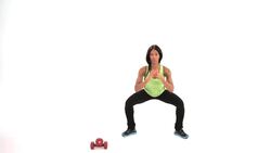 How to Do a Sumo Jump Squat with Weights Instructional Video