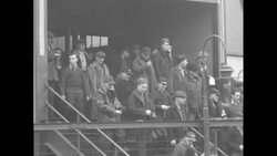 1937 auto workers strike in Flint, MI, with shots of strikers in plant and opinions on both sides News Clip