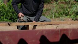 Roofers are hammering nails Stock Footage
