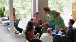 Biologists Working Together While Their Teacher Helps Them Stock Footage