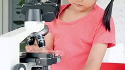 Education Topics:Funny little girl doing experiments in the laboratory.Science and education Stock Footage