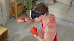 Boxer Practicing Punches in VR Goggles Stock Footage