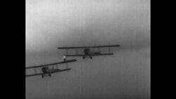 Stuntman performing on planes in flight in US News Clip