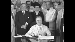 President Franklin D. Roosevelt signs Social Security Act during the Great Depression News Clip