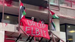 Allianz offices in London occupied and daubed with paint News Clip