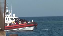 CLEAN : Over a hundred migrants arrive on the southern Italian island of Lampedusa News Clip