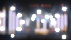 Rays of searchlights at a concert. The effect of bokeh at the festival of music. A scene at the festival of electronic music. Stock Footage