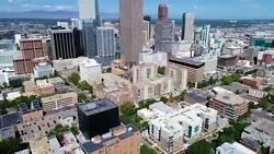 Panning up to Denver , Colorado Skyline Cityscape of Downtown Mile High City Stock Footage