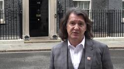 Anneka Rice and Scott Mitchell hand over Alzheimer's Research UK petition at Downing Street News Clip