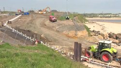 Engineers working on an undersea cable project News Clip