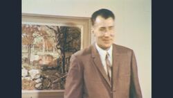 1960s: Man in suit speaks directly to viewer Stock Footage