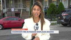 Officials: Dozens displaced, firefighter hurt in overnight Passaic fire News Clip