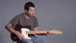How to Play an A Minor 7 Barre Chord on Guitar Instructional Video