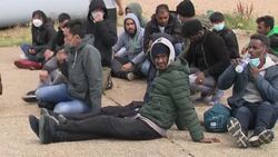 Rescued migrants led ashore in Dover News Clip