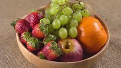 4k Rotate of mix fruit in wooden bowl. Stock Footage