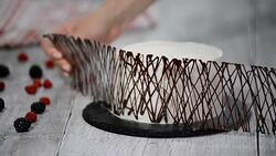 Decoration the cake with chocolate. Chocolate cake with cream. Stock Footage