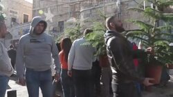 CLEAN : US ambassador joins Santa to wish Jerusalemites happy holidays News Clip