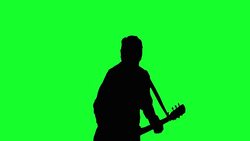Cool rock guitarist playing the acoustic guitar on the Green Screen. Stock Footage
