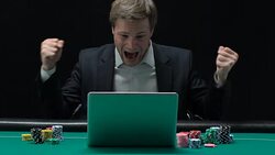 Excited man sincerely rejoicing at winning big sum of money in online casino Stock Footage