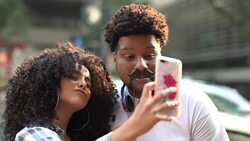 Young Couple Taking a Selfie Outdoors Stock Footage