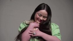 Model with Down syndrome reacts to new Barbie News Clip