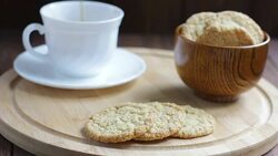 Tea with Oat Cookies on Wooden Background Stock Footage