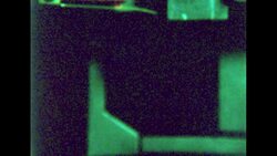 UNITED STATES 1960s: Patterns of light flash, zoom out to machinery. Stock Footage