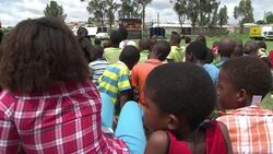 CLEAN : South Africans watch Mandela News Clip