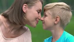 Son and mum nuzzling, love each other, single mother happy with beloved child Stock Footage