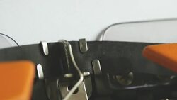 Close up footage of a person writing NUCLEAR WEAPONS on an old typewriter, with sound Stock Footage