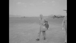 General William Harrison Jr., US Army, crosses tarmac at Seoul airport and boards helicopter in May 1953 News Clip