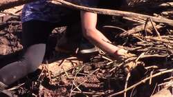 Relatives search mud for dam collapse victims Instructional Video