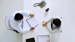 doctor with diet plan and patient at hospital Stock Footage