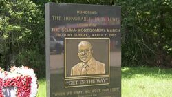 CLEAN : People pay tribute to John Lewis near Alabama bridge where he was nearly beaten to death News Clip