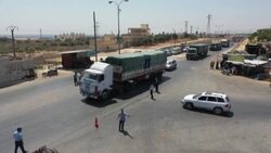CLEAN : International humanitarian aid convoy arrives in Syria's Idlib News Clip