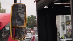 London bus stop with signs advising of social distancing measures News Clip