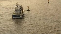Police boat watch on as anti-lockdown protester climbed on London's Big Ben News Clip