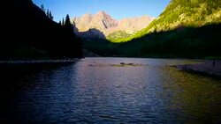 Amazing Sunrise at Maroon Bells , Colorado Aerial drone view backing away from the Infamous Aspen Peaks Stock Footage
