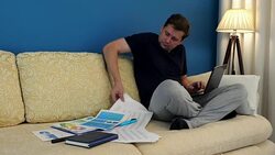 Man is working at home with financial documents. Self employment. Stock Footage