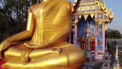 CLEAN : Thai temple puts facemask on giant Buddha statue News Clip