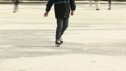 People ice skate on Edinburgh's frozen Inverleith Park pond News Clip